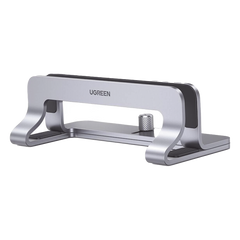 Soporte Vertical para Laptop / Adecuado para escritorio / Anchura Ajustable (12-26mm) / Amplia compatibilidad / Anti-Arañazos / Anti-Deslizante /Ajustable Mediante Tornillos / Color Plata / Aluminio + Silicona