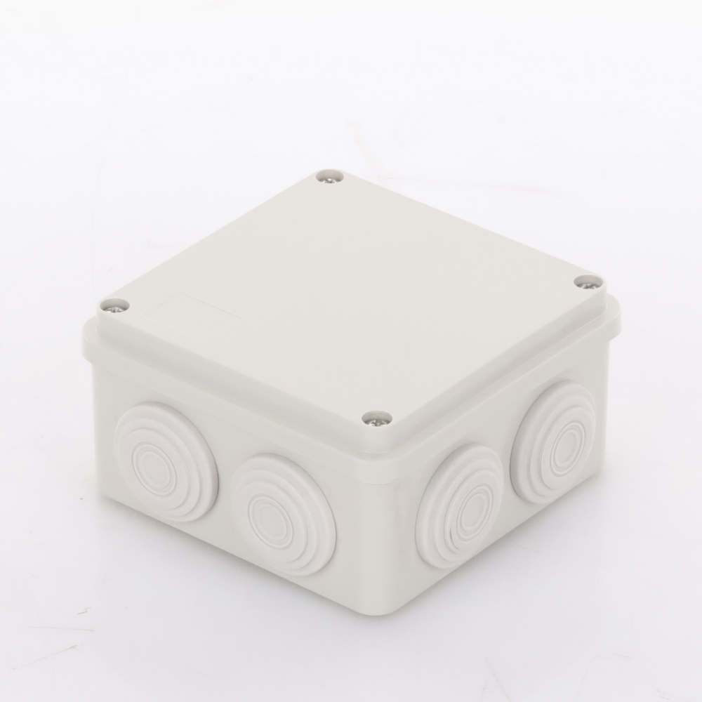 Caja Derivación-Conexión de Plástico (100 X 100 X 54 mm) con 7 Glándulas de Goma. Para Instalaciones Comerciales, Residenciales e Industriales. Incluye Tornillería para su Tapa.
