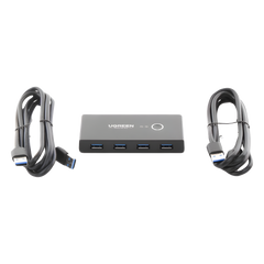 Conmutador USB para Compartir 4 Puertos USB 3.0 a 2 PC Ìs | Cambio Mediante Botón | Incluye Dos Cables USB de 1.5 m | ABS | Permite que 2 Usuarios Compartan 4 Dispositivos Periféricos USB3.0, como una impresora, un escáner, etc.